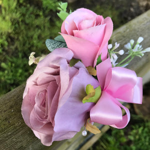 a wedding bouquet collection of pink and mauve flowers