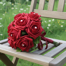A wedding bouquet collection of red foam roses with diamante centres
