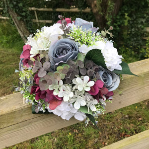 Wedding bouquet in shades of lilac grey burgundy and pink