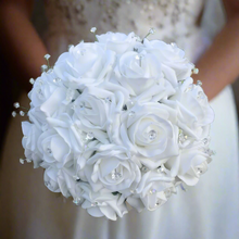 A wedding bouquet collection of white foam roses and crystals