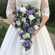 A teardrop bouquet collection of ivory and lilac artificial roses