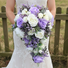 A teardrop bouquet collection of peonies and lilac artificial roses