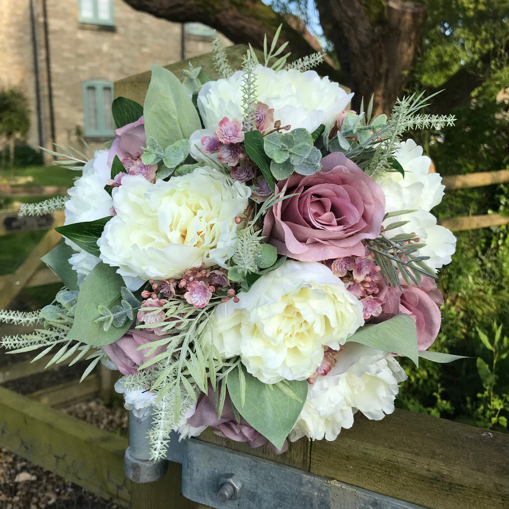 wedding bouquet collection featuring dusky pink roses and peonies ...