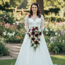 A bridal bouquet of burgundy & blush pink flowers