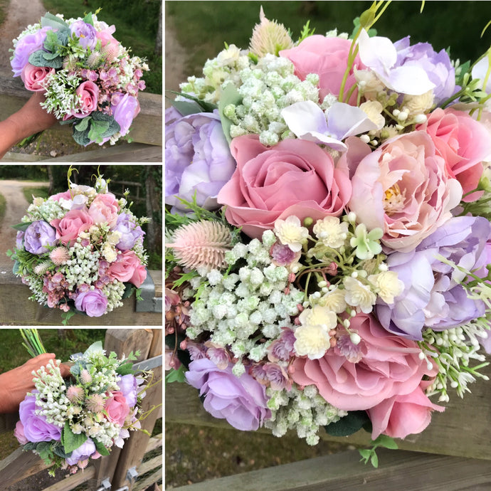 a wedding bouquet of artificial silk ivory hydrangea and lilac rose flowers