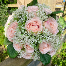 A bridal bouquet collection of gypsophilia & blush coloured roses