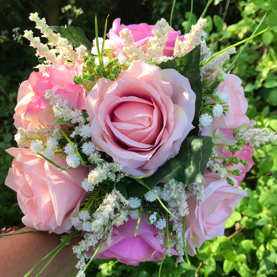 A wedding bouquet collection of artificial silk pink roses & hydrangea flowers