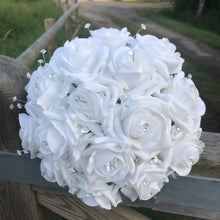 A wedding bouquet collection of white foam roses and crystals
