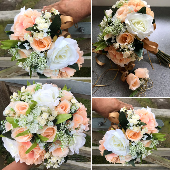 A wedding bouquet featuring silk flowers in shades of ivory and peach
