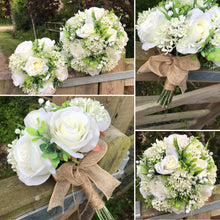 A wedding bouquet collection of ivory artificial silk roses