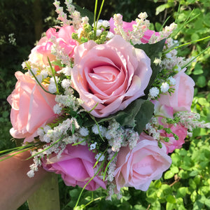 A wedding bouquet collection of artificial silk pink roses & hydrangea flowers