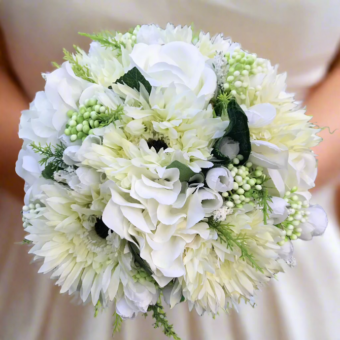 A bridal bouquet collection of ivory and white silk flowers