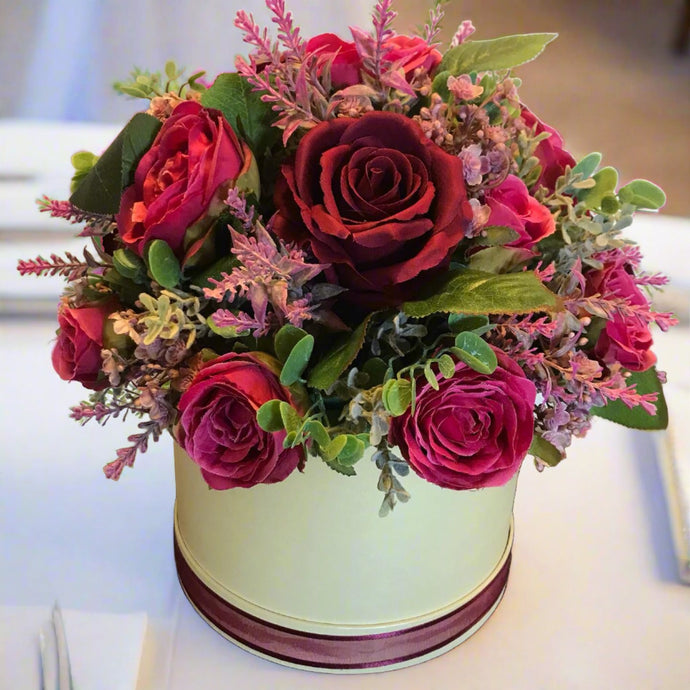 XL Burgundy and raspberry faux silk roses arranged in a cream hat box
