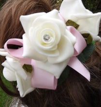 a bridesmaids hair comb of ivory roses (choice of ribbon colour)