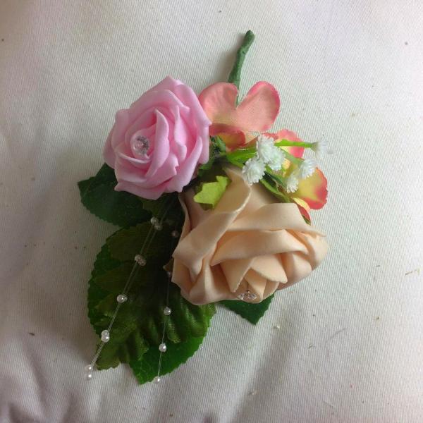 pink and peach artificial corsage