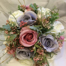 brides bouquet of lilac/grey and pink flowers