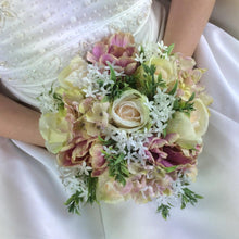 A wedding bouquet of artificial silk pink Flowers