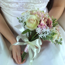 A wedding bouquet of artificial silk pink Flowers