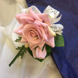corsage of dusky pink roses