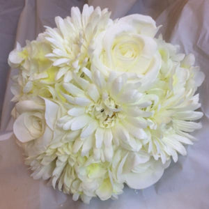 A wedding bouquet of artificial ivory silk roses, gerbera & hydrangea