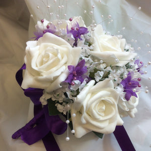 Ivory and purple bridesmaids wedding bouquet