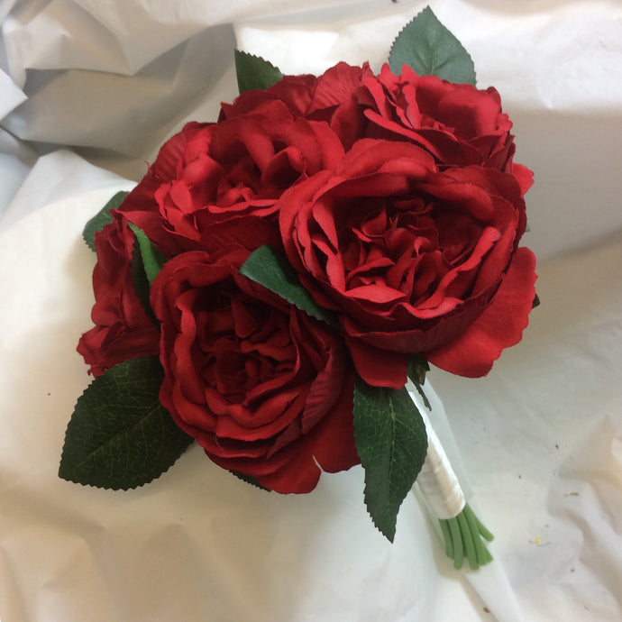 wedding bouquet of large red david austin silk roses