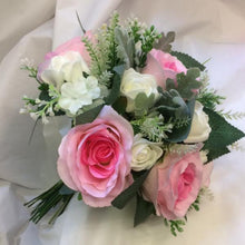 artificial wedding bouquet of pink and ivory flowers
