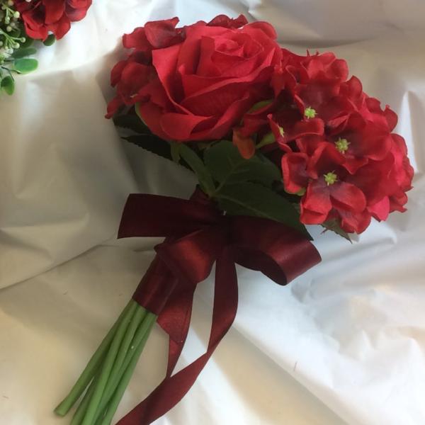 bridesmaids wedding bouquet of red artificial flowers