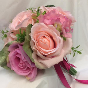 A wedding bouquet collection of artificial silk pink roses & hydrangea flowers