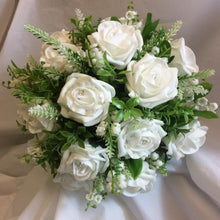 white or ivory wedding bouquet of foam roses, gyp and foliage