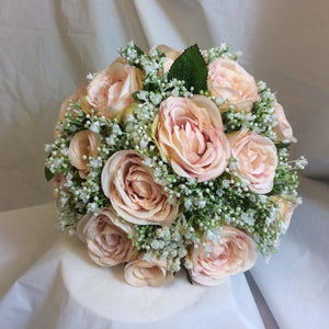 A bridal bouquet collection of gypsophilia & blush coloured roses