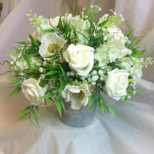 ivory artificial flower arrangement