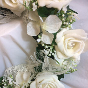 wired circlet of ivory foam roses, hydrangea and lace