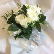 A wedding bouquet collection of silk ivory roses with diamante & pearls