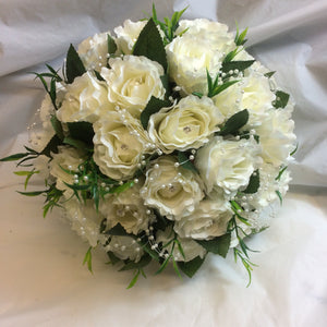 A wedding bouquet collection of silk ivory roses with diamante & pearls