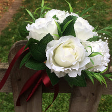 A wedding bouquet collection of silk ivory roses with diamante & pearls