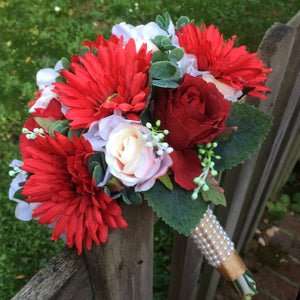 artificial silk wedding bouquet in shades of red, ivory and peach