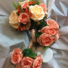 A wedding bouquet collection of artificial peach roses