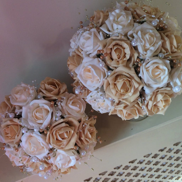 wedding bouquet of gold and cream foam roses and pearls