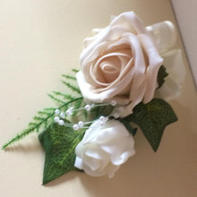 a corsage for the mothers of the bride