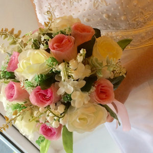 artificial wedding bouquet of pink and ivory flowers