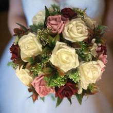 A wedding bouquet of artificial silk and foam rose flowers