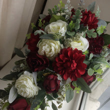 A teardrop bouquet collection of artificial silk burgundy and ivory flowers