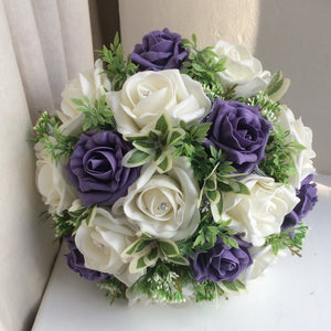 an artificial wedding bouquet of light purple and ivory foam roses