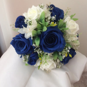 a wedding bouquet of royal blue silk and white foam roses