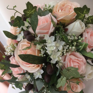 A wedding collection featuring artificial blush and pink flowers
