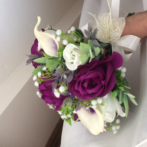wedding bouquet featuring calla lilies and rose in shades of purple