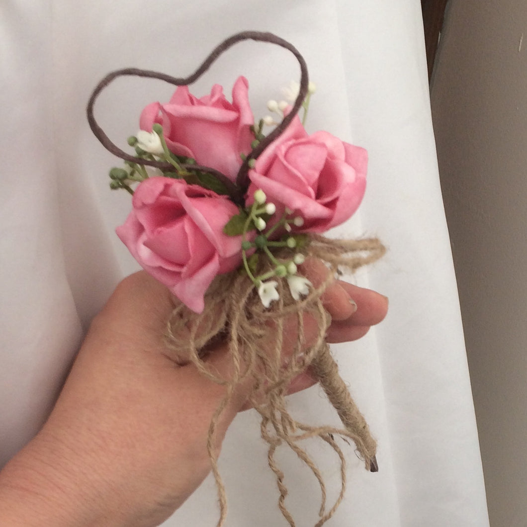 a dainty bridesmaid want featuring gyp and pink foam roses