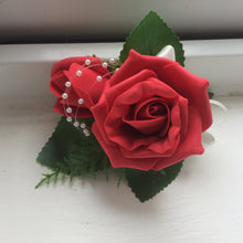 a corsage featuring foam roses in a choice of 35 colours