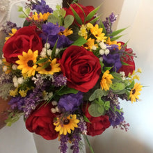 brides bouquet of artificial red, purple and yellow flowers